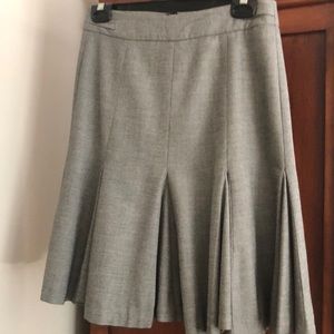 Pleated skirt perfect for office or night out.